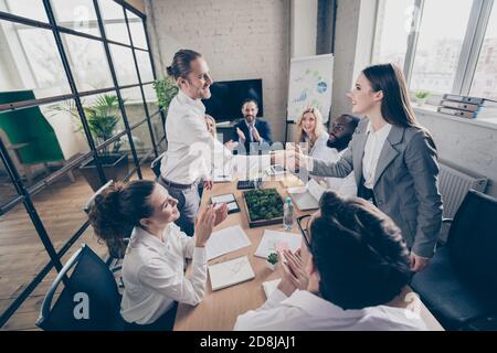Photo of business people diversity age race partners anti crisis crash community handshake greeting new colleague member candidate teambuilding Stock Photo