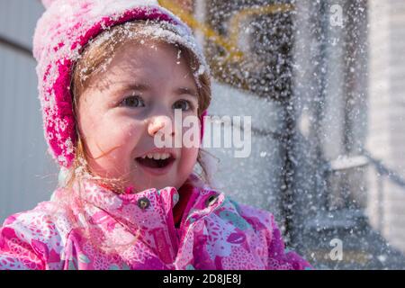 emotional portrait of cute little girl in winter Stock Photo