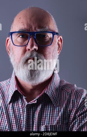 Portrait of a hairy old man of 70 Stock Photo - Alamy