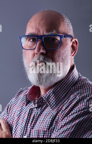 Portrait of a hairy old man of 70 Stock Photo - Alamy