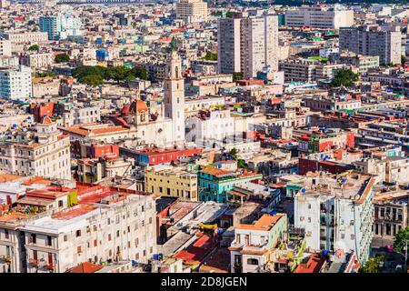 Aerial view of Municipality of Centro Habana at sunset. Highlights Church of Our Lady of Carmen and its high bell tower. La Habana - La Havana, Cuba, Stock Photo