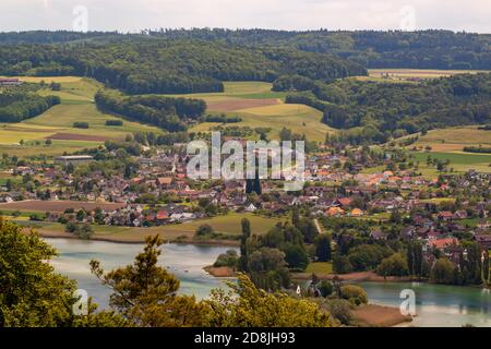 Aerial view of the scenic Swiss town of Stein am Rhein near river Rhine. Image features traditional houses, St George's Abbey, farm lands, meadows and Stock Photo