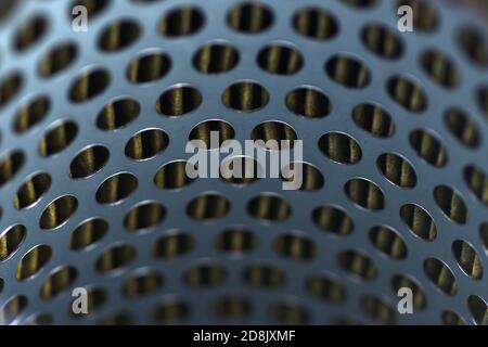 detail of a tractor oil filter creates an industrial textured background Stock Photo