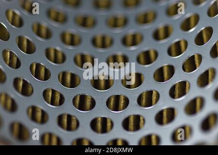 detail of a tractor oil filter creates an industrial textured background Stock Photo