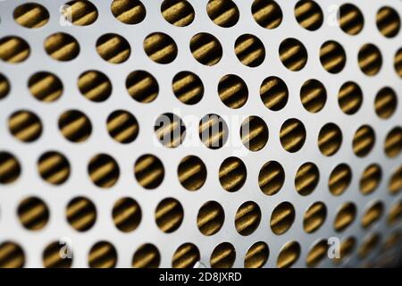 detail of a tractor oil filter creates an industrial textured background Stock Photo
