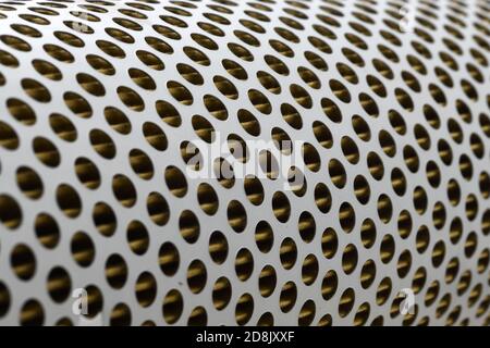 detail of a tractor oil filter creates an industrial textured background Stock Photo