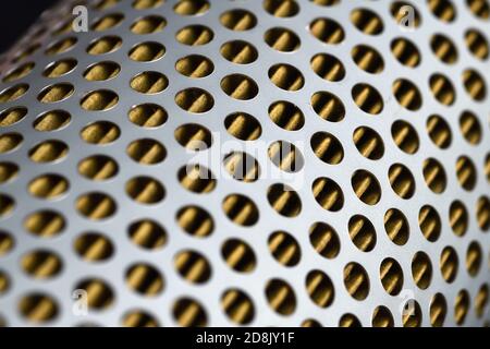 detail of a tractor oil filter creates an industrial textured background Stock Photo