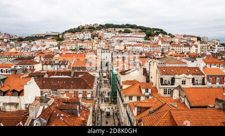 Skyline aerial view of Lisbon old city, Portugal. View to Rua de Santa Justa street and Castle of Sao Jorge (Castelo de Sao Jorge) from viewpoint Mira Stock Photo