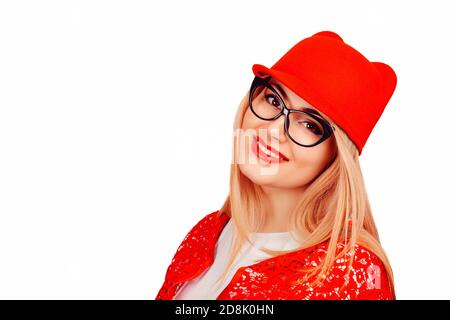 Happy stylish girl. Pretty cool woman in red cap looking at you camera having fun smiling wearing red lace jacket and white formal shirt isolated on w Stock Photo