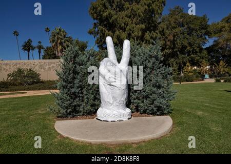 Beverly Hills, USA. 30th Oct, 2020. The city of Beverly Hills prepares for possible rioting and looting from the national election outcome. Artwork by Ringo Starr, 'Peace and Love, ' in Beverly Hills park covered in protective material. 10/30/2020 Beverly Hills. CA USA (Photo by Ted Soqui/SIPA USA) Credit: Sipa USA/Alamy Live News Stock Photo