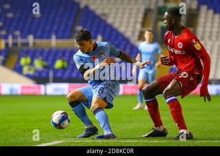 Birmingham, UK. 30th Oct, 2020. Jamie Allen of Coventry City shields the ball from Alf Semedo of Reading (on loan from Benfica) during the Sky Bet Championship match between Coventry City and Reading at St Andrews, Birmingham, England on 30 October 2020. Photo by Nick Browning/PRiME Media Images. Credit: PRiME Media Images/Alamy Live News Stock Photo