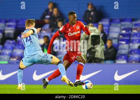 Birmingham, UK. 30th Oct, 2020. Alf Semedo of Reading (on loan from Benfica) is tackled by Ben Sheaf of Coventry City (on loan from Arsenal) during the Sky Bet Championship match between Coventry City and Reading at St Andrews, Birmingham, England on 30 October 2020. Photo by Nick Browning/PRiME Media Images. Credit: PRiME Media Images/Alamy Live News Stock Photo