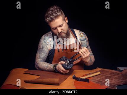 Artisan keen on one's business in the workshop Stock Photo