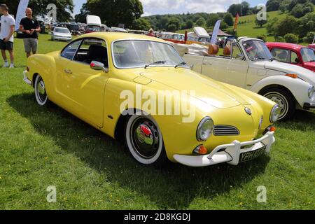 A VW Karmann Ghia displayed at the annual gathering of Volkswagen owners at Stonor Park, Oxfordshire, UK Stock Photo