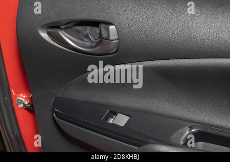 Rear Door Handle and Side Mirror Control Switch of Car in Zoom View Stock Photo