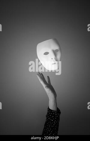 The mask is a symbol of duplicity. Stock Photo