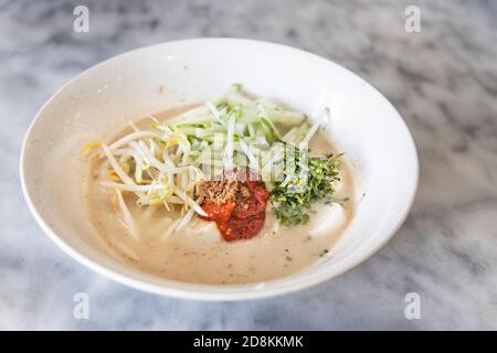Laksam, flat rice noodle with vegetable in gravy Stock Photo