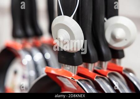 DSG retail do not open before purchase security tag Stock Photo