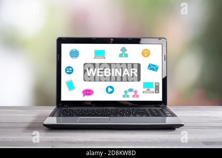 Webinar concept shown on a laptop screen Stock Photo