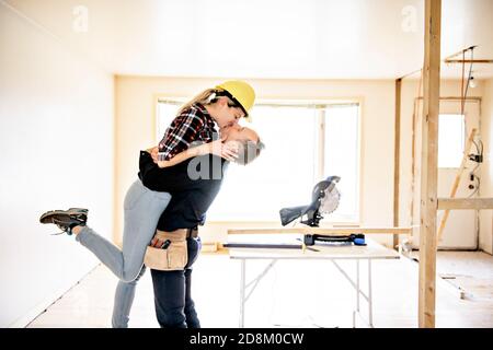 A couple worker in the carpenter workroom renovation Stock Photo