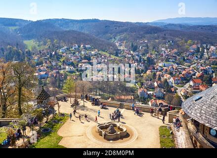 Tourists in the castle courtyard in Wernigerode with the old town in the background. Germany Stock Photo