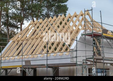 construction site of a detached house with wooden roof truss Stock Photo