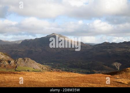 Harter Fell rising above Eskdale, in the English Lake District Stock Photo