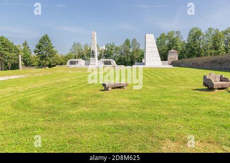 Editorial: MAUTHAUSEN, UPPER AUSTRIA, AUSTRIA, August 13, 2020 - Memorial monument in the Mauthausen concentration camp just outside the wall Stock Photo