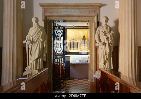 Interior of the shrine of Santa Maria della Bassanella in Soave, Italy, with the marble statues of Saint Paul and Saint Peter at the sides of the sacr Stock Photo