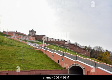 A panoramic view of the Chkalov Staircase on the background of the Novgorod Kremlin, in the autumn light. Stock Photo