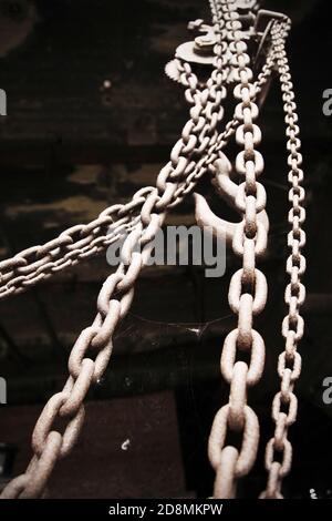 Rusty steel chains and hook. Stock Photo