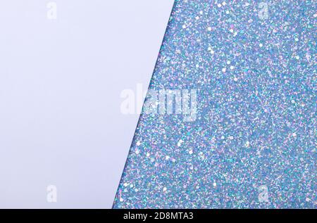 Holographic bright white glitter real texture background with rectangular sequins. Stock Photo