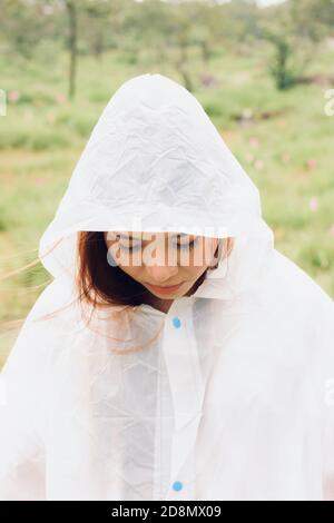 close up woman wear raincoat stand in the rainforest Stock Photo Alamy