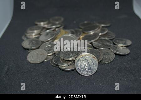 close up image of a pile of Philippine Peso coins under President Rodrigo Duterte's Presidential Management Stock Photo