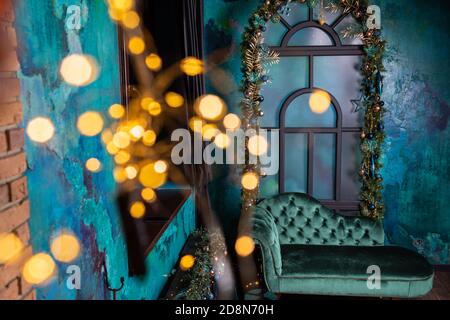 Room decorated to christmas celebration in blue luxury colors with light. Stock Photo