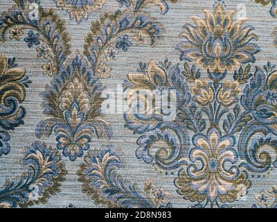 Carpet Texture with Patterns. Suitable for Creating a Background. Damask Golden Floral Pattern Stock Photo