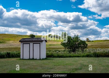 Double Outhouse at Custer House in Fort Abraham Lincoln State Park in North Dakota Stock Photo