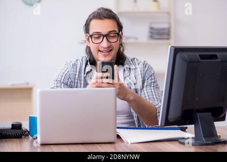 Male it specialist working in the office Stock Photo