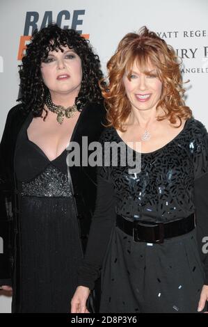 Ann Wilson and Nancy Wilson arrives at 17th Annual Race To Erase Hyatt Regency Century Plaza on 5/7/2010 in LA, California. Stock Photo