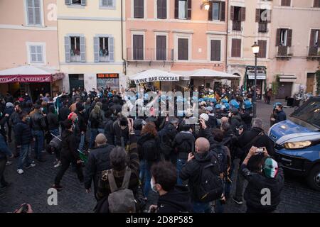 Rome, Italy. 31st Oct, 2020. Moments of clashes of the demonstrators with the police at Campo de Fiori in Rome (Photo by Matteo Nardone/Pacific Press) Credit: Pacific Press Media Production Corp./Alamy Live News Stock Photo
