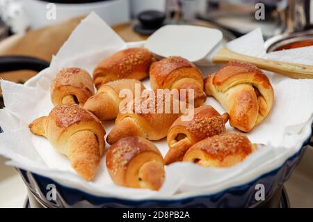 home-made baking croissants, stuffed with apples, ready to eat Stock Photo