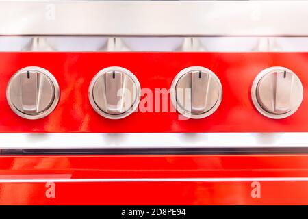 switches on the electric stove and gas stove Stock Photo