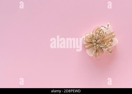 Homemade christmas decoration on pastel pink background. Christmas or New Year 2021 minimal concept. View from above Stock Photo