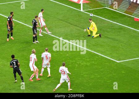 Cologne, Germany. 31st Oct, 2020. Serge Gnabry (1st, L) of Munich scores during a German Bundesliga football match between FC Bayern Munich and FC Cologne in Cologne, Germany, Oct. 31, 2020. Credit: Ulrich Hufnagel/Xinhua/Alamy Live News Stock Photo