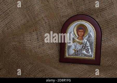 Christian icon of the Archangel Michael with silver and gilding. The inscription in Russian is translated: holy guardian angel. Attributes Orthodox Ch Stock Photo
