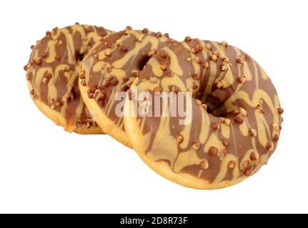 Millionaire doughnuts drizzled with icing and topped with chocolate crispies isolated on a white background Stock Photo