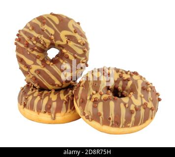 Millionaire doughnuts drizzled with icing and topped with chocolate crispies isolated on a white background Stock Photo