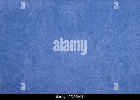 blue Abstract Artificial texture fur fabric, background, closeup. Fluffy material backdrop, kids toys faux fur. Stock Photo