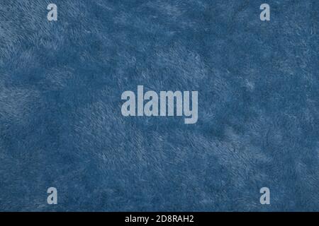 blue Abstract Artificial texture fur fabric, background, closeup. Fluffy material backdrop, kids toys faux fur. Stock Photo