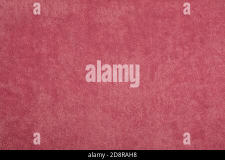 pink Abstract Artificial texture fur fabric, background, closeup. Fluffy material backdrop, kids toys faux fur. Stock Photo
